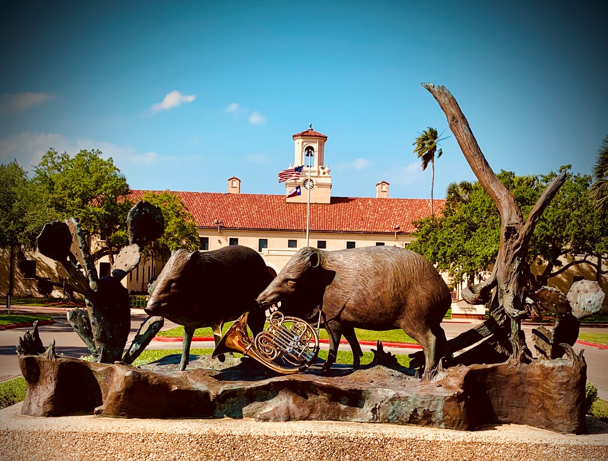 javelina statues with a french horn